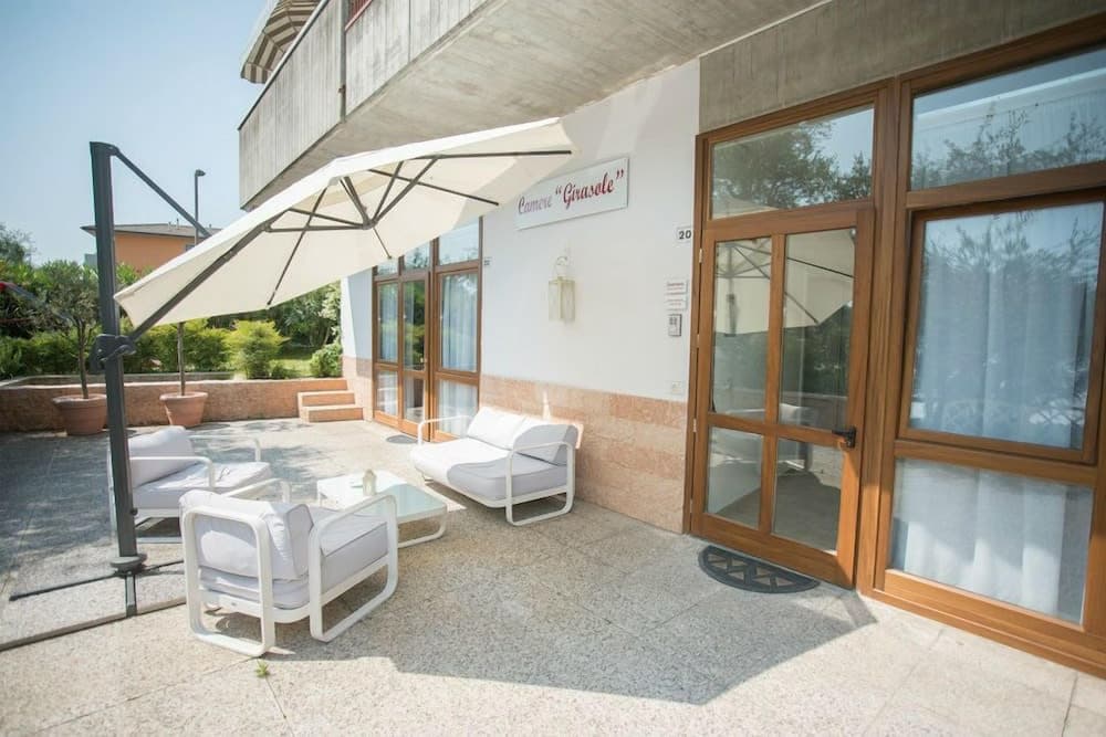 Covered patio with ocean view