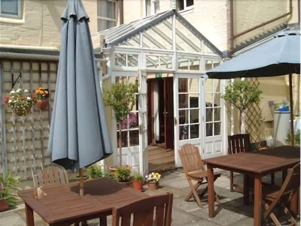 Covered patio with ocean view
