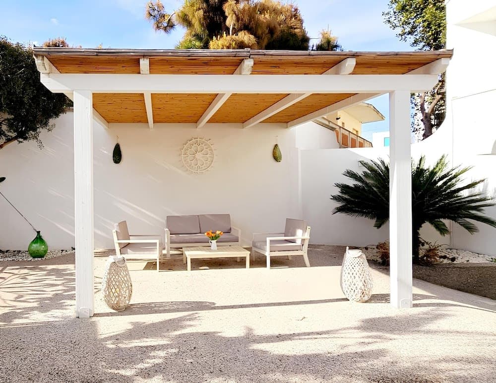 Covered patio with ocean view