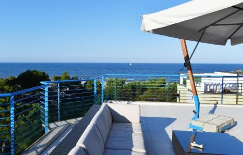 Covered patio with ocean view