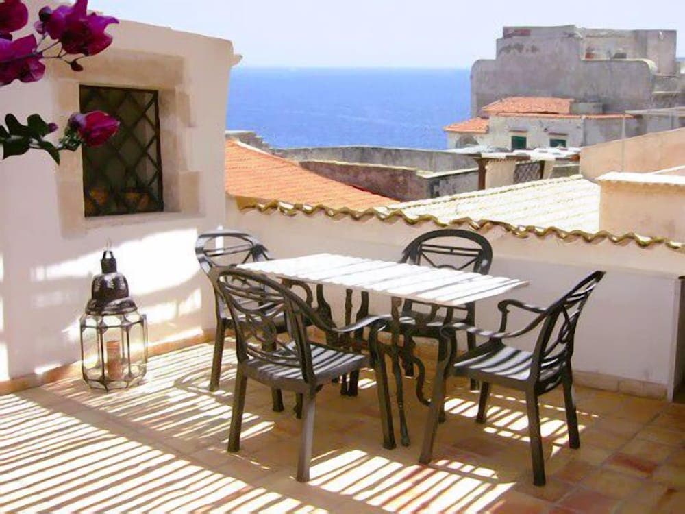 Covered patio with ocean view