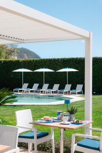 Covered patio with ocean view