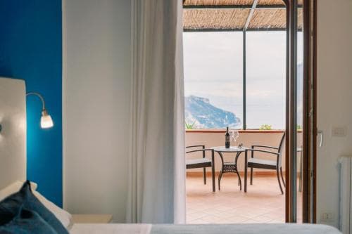 Covered patio with ocean view