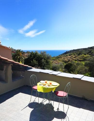Covered patio with ocean view