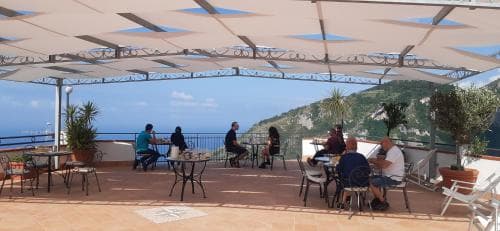 Covered patio with ocean view