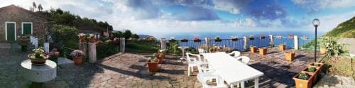 Covered patio with ocean view