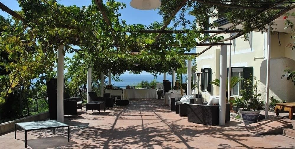 Covered patio with ocean view