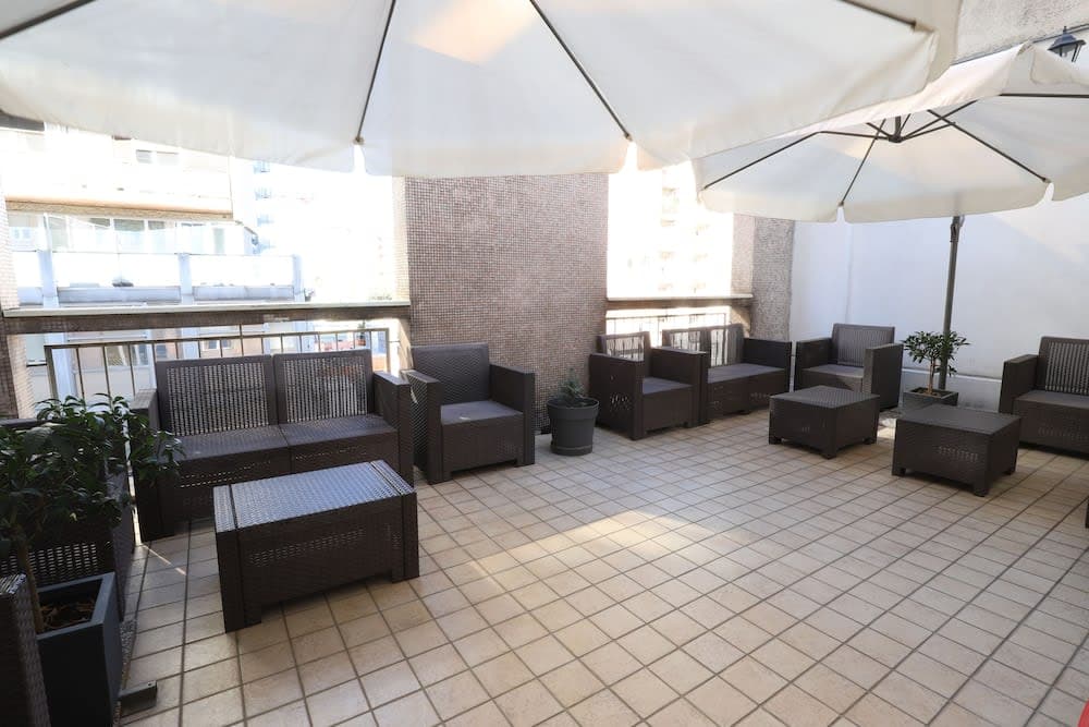 Covered patio with ocean view