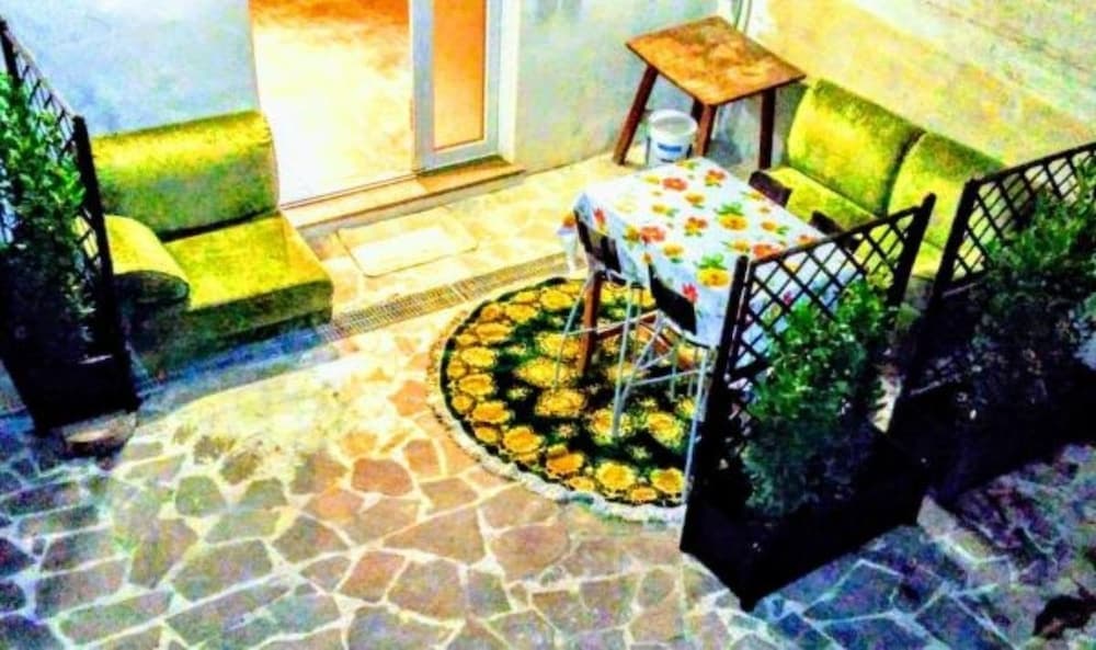 Covered patio with ocean view