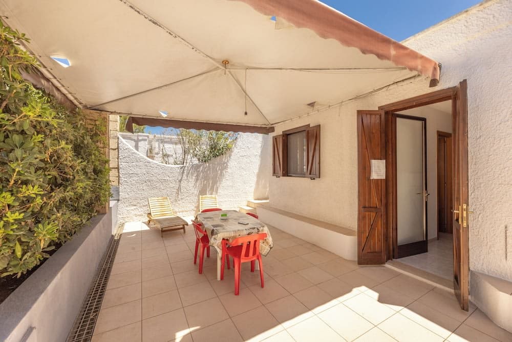 Covered patio with ocean view