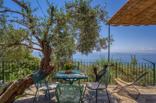 Covered patio with ocean view
