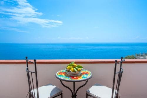 Covered patio with ocean view