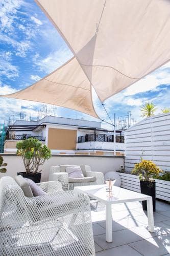 Covered patio with ocean view