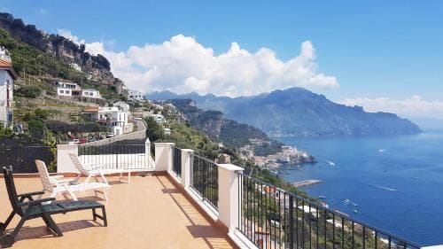 Covered patio with ocean view