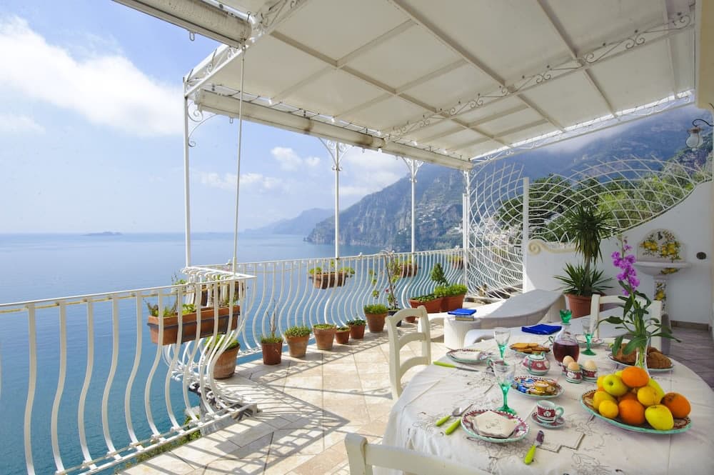 Covered patio with ocean view