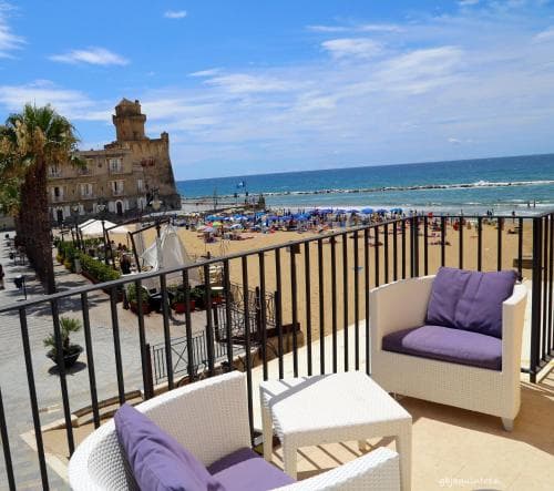 Covered patio with ocean view
