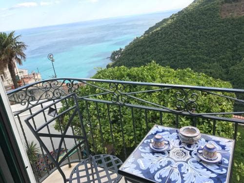 Covered patio with ocean view