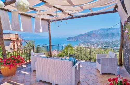 Covered patio with ocean view