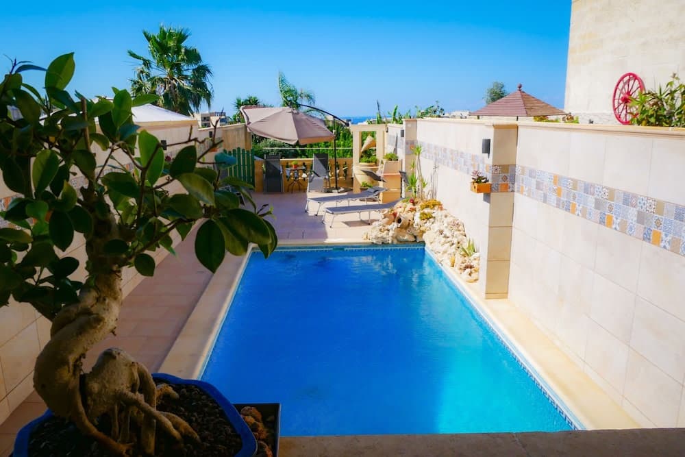 Covered patio with ocean view