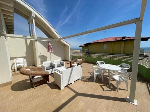 Covered patio with ocean view