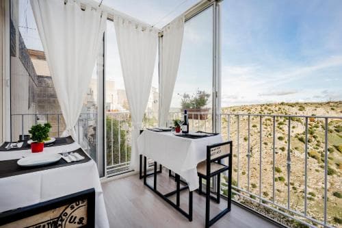 Covered patio with ocean view