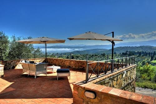 Covered patio with ocean view