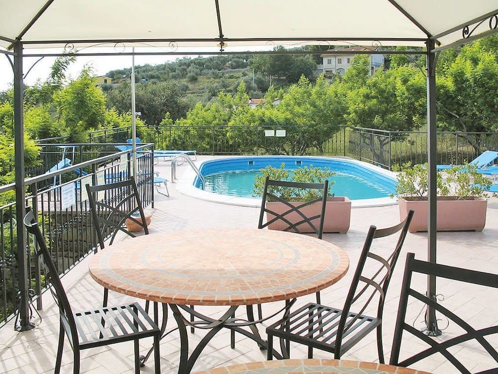 Covered patio with ocean view