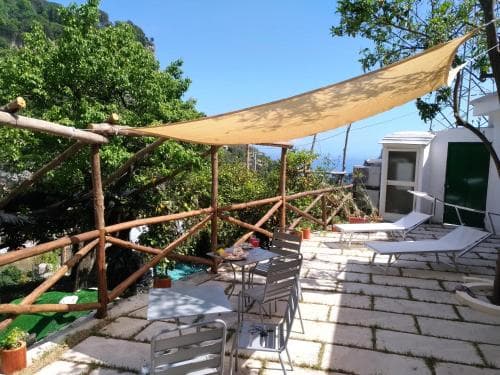 Covered patio with ocean view
