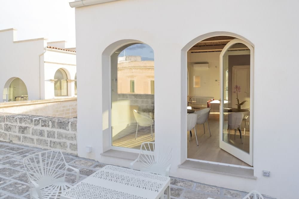 Covered patio with ocean view