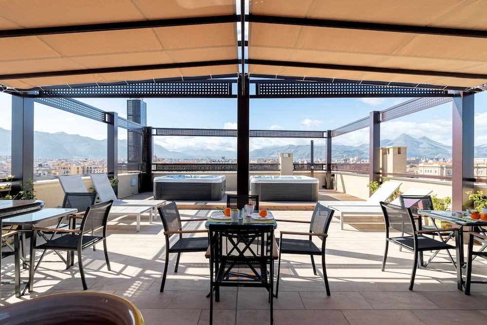 Covered patio with ocean view