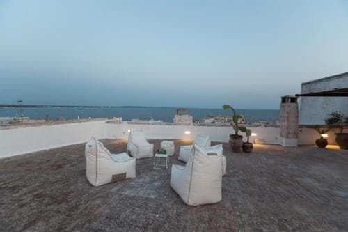Covered patio with ocean view