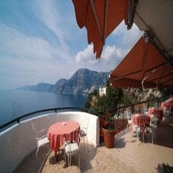 Covered patio with ocean view