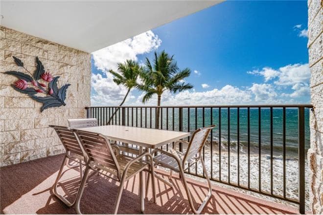 Covered patio with ocean view