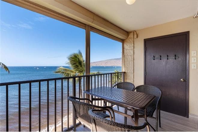 Covered patio with ocean view