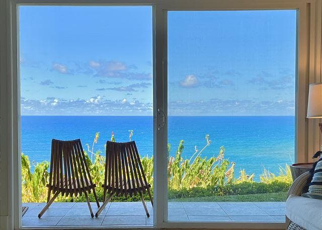 Covered patio with ocean view