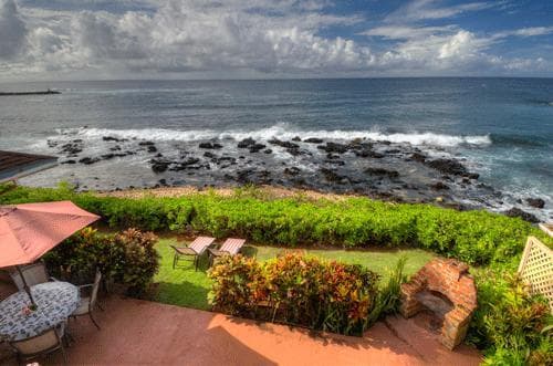 Covered patio with ocean view