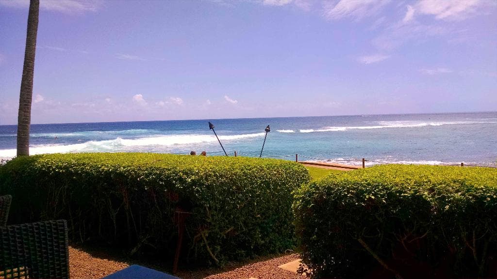 Covered patio with ocean view